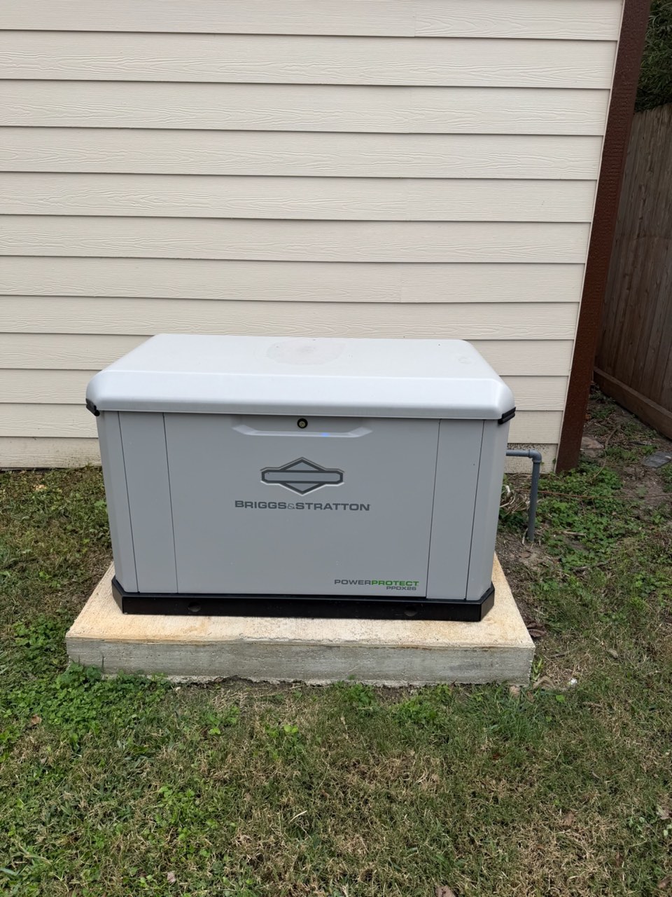 Generac home standby generator installed in a Houston backyard